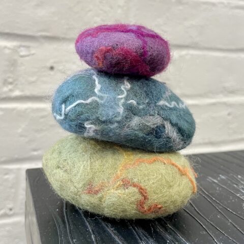 stacked rocks covered in felt